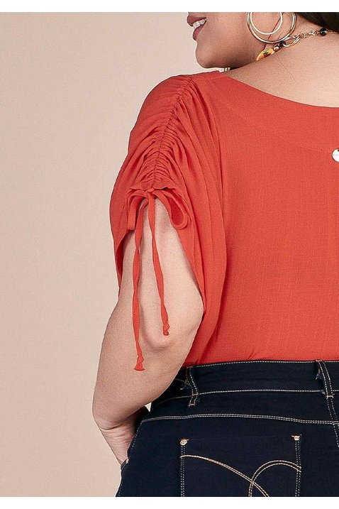 blusa laranja plus detalhe amarracao nos ombros titanium jeans costas cima detalhe